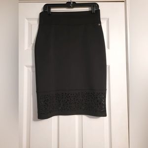 Skirt with decorative hem. Size 8 worn twice.